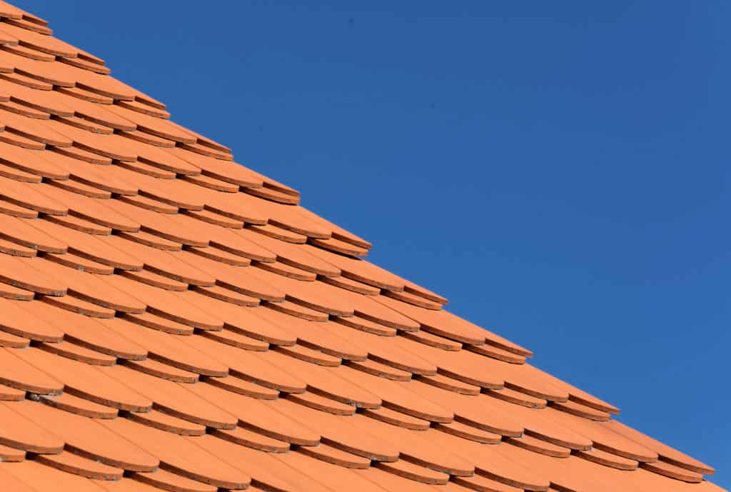 orange clay tile roof and blue sky